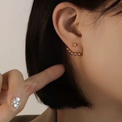 Aretes de bolitas doradas